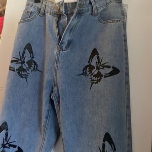 Large butterfly print jeans